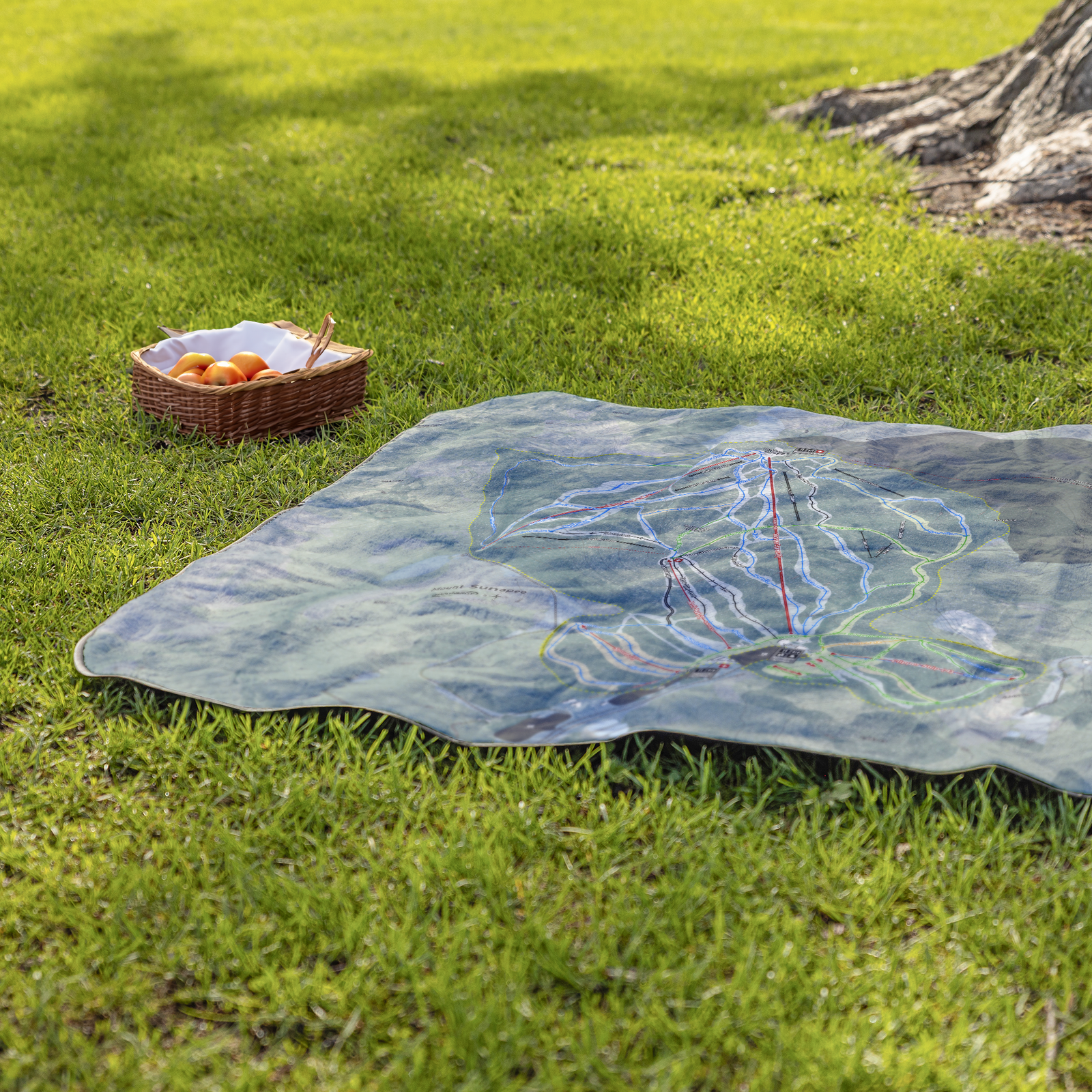MountSunapee_StadiumBlanket_Lifestyle_Grass_V_AS_Mockup.png