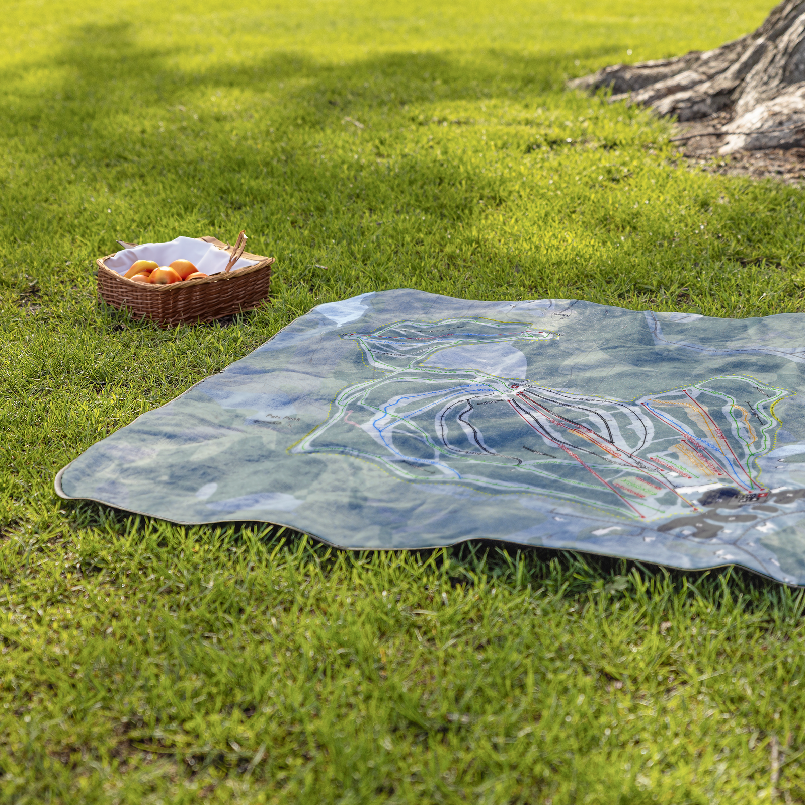 PatsPeak_StadiumBlanket_Lifestyle_Grass_V_AS_Mockup.png
