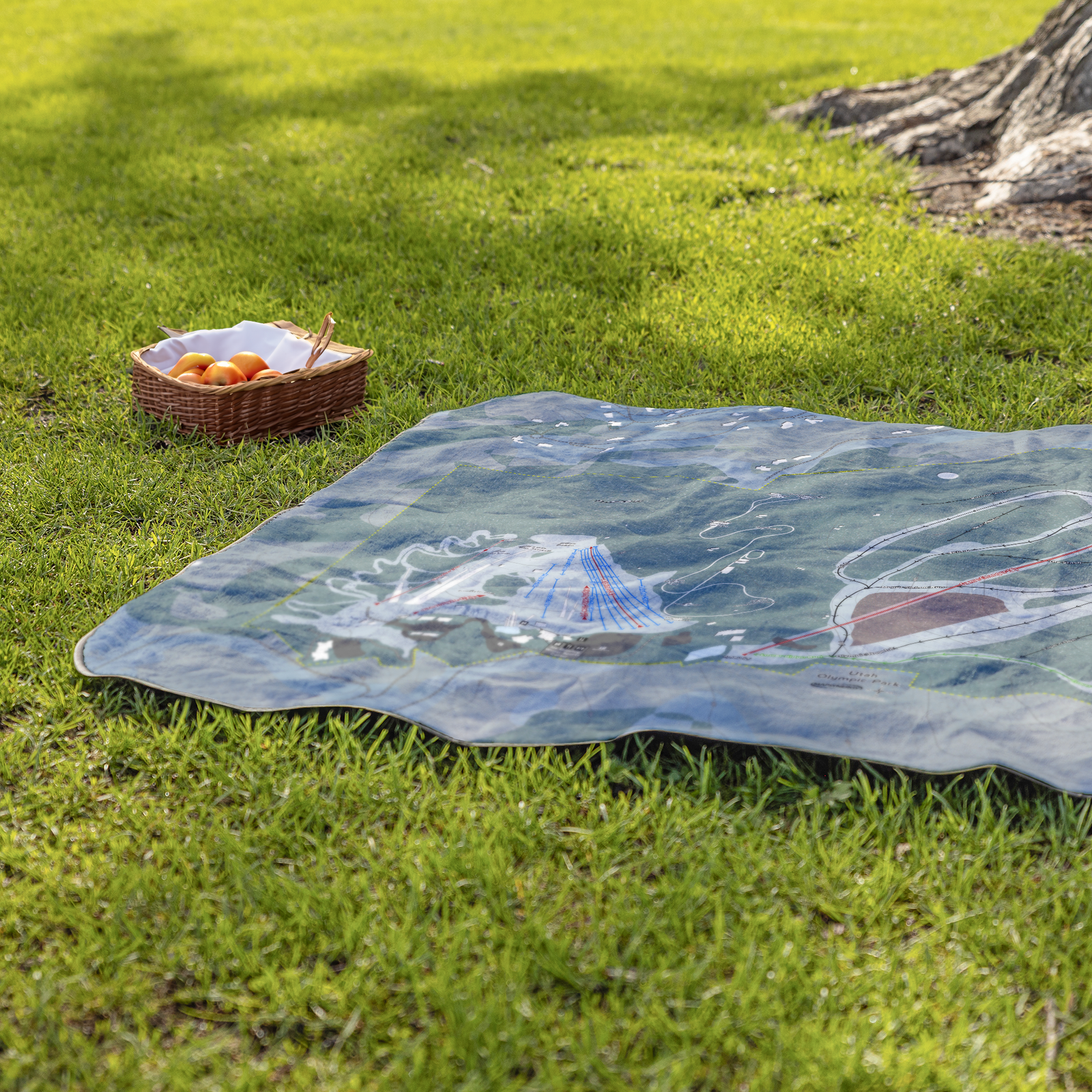 UtahOlympicPark_StadiumBlanket_Lifestyle_Grass_V_AS_Mockup.png