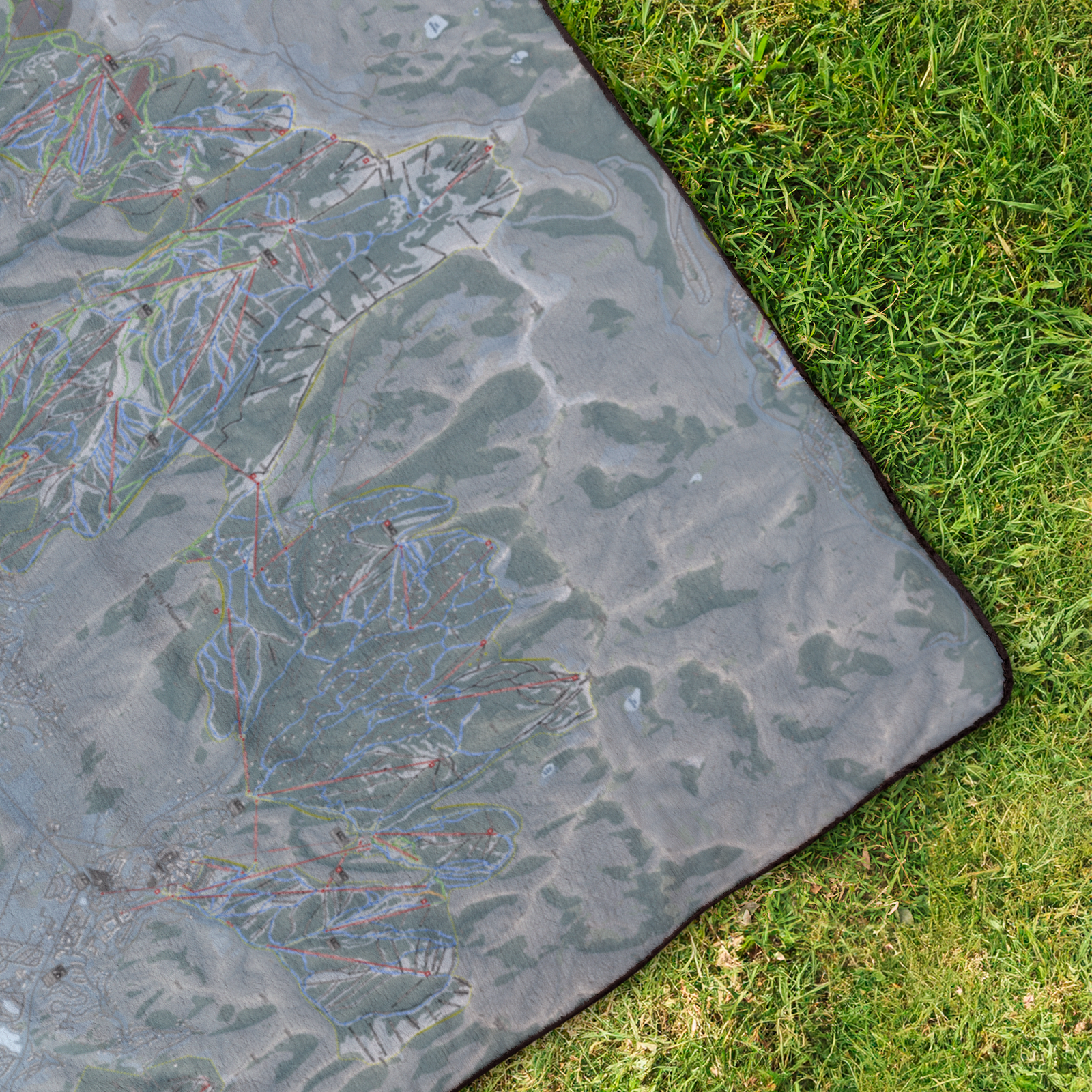 WasatchBack_StadiumBlanket_OverheadGrass_V_Mockup.png