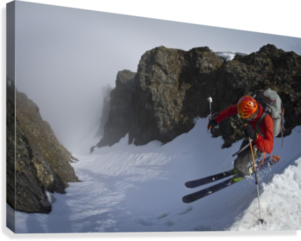 Backcountry skier on West Twin Peak near Eklutna - Powderaddicts