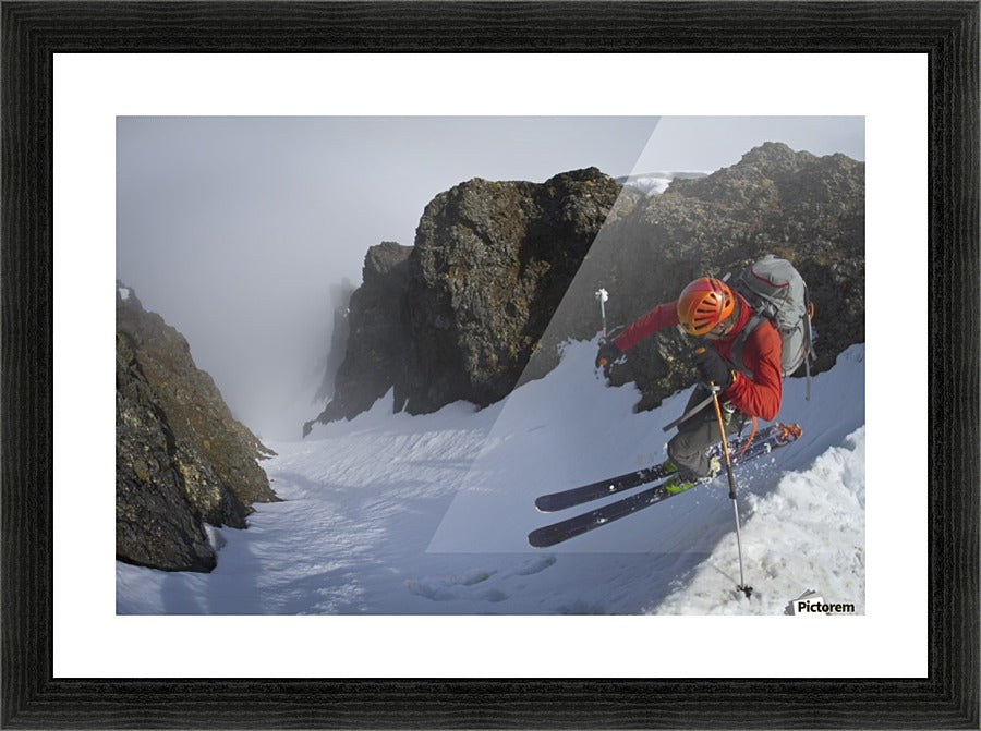 Backcountry skier on West Twin Peak near Eklutna - Powderaddicts