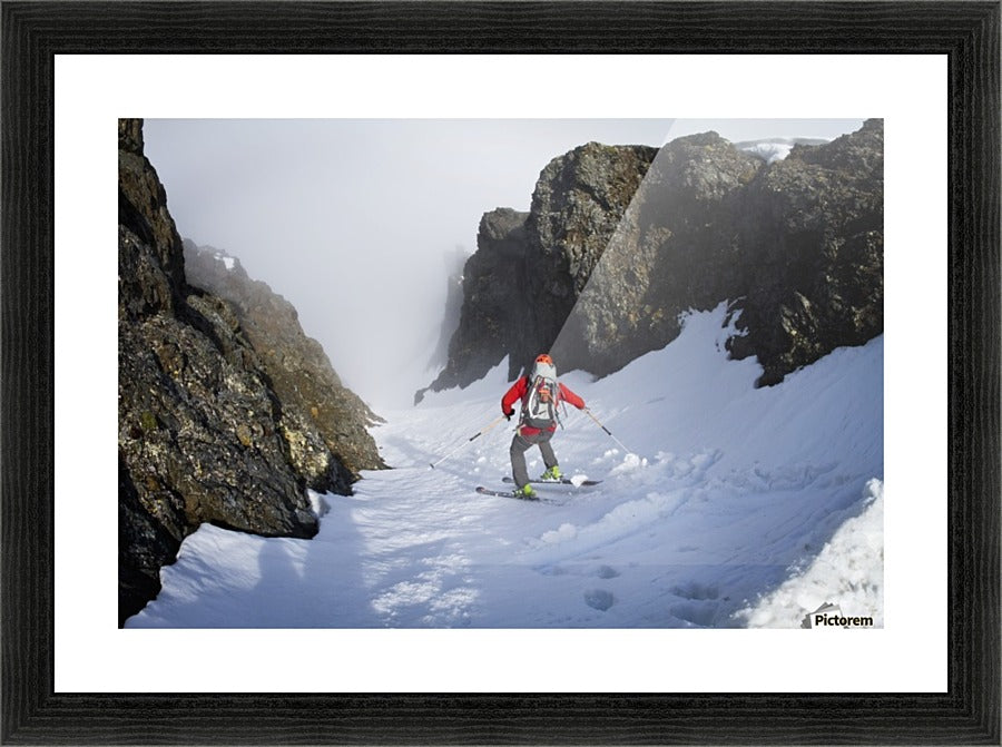 Backcountry skier on West Twin Peak near Eklutna, Western Chugach Mountains, Southcentral Alaska, Winter - Powderaddicts