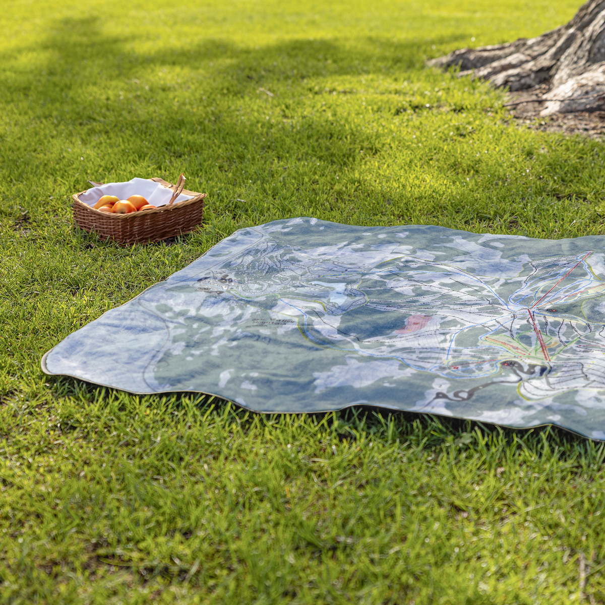 BearValleyMountain_StadiumBlanket_Lifestyle_Grass_V_AS_Mockup.png