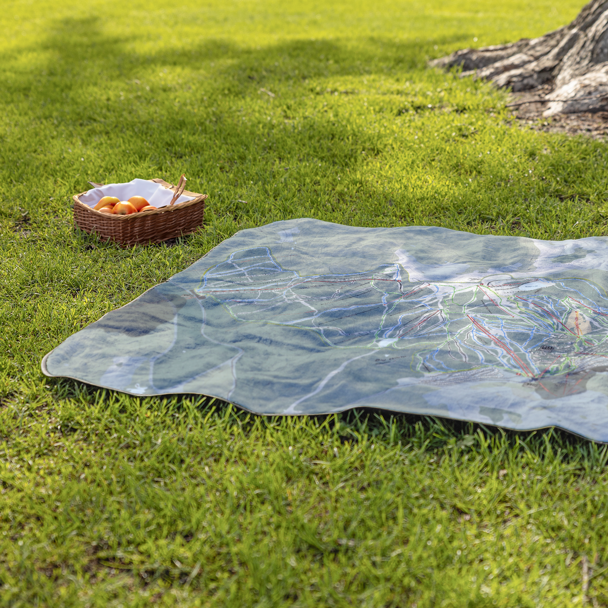 BigWhite_StadiumBlanket_Lifestyle_Grass_V_AS_Mockup.png
