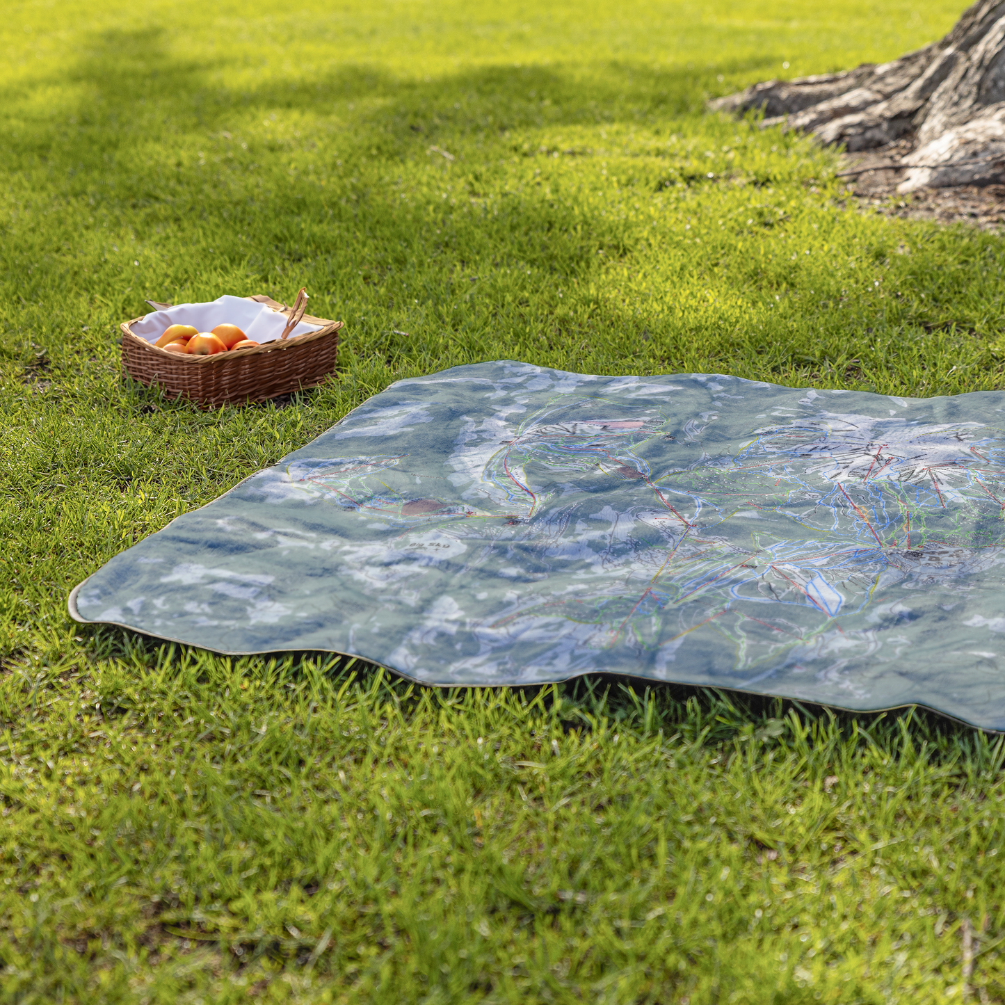 Big_Sky_Combo_StadiumBlanket_Lifestyle_Grass_V_AS_Mockup.png