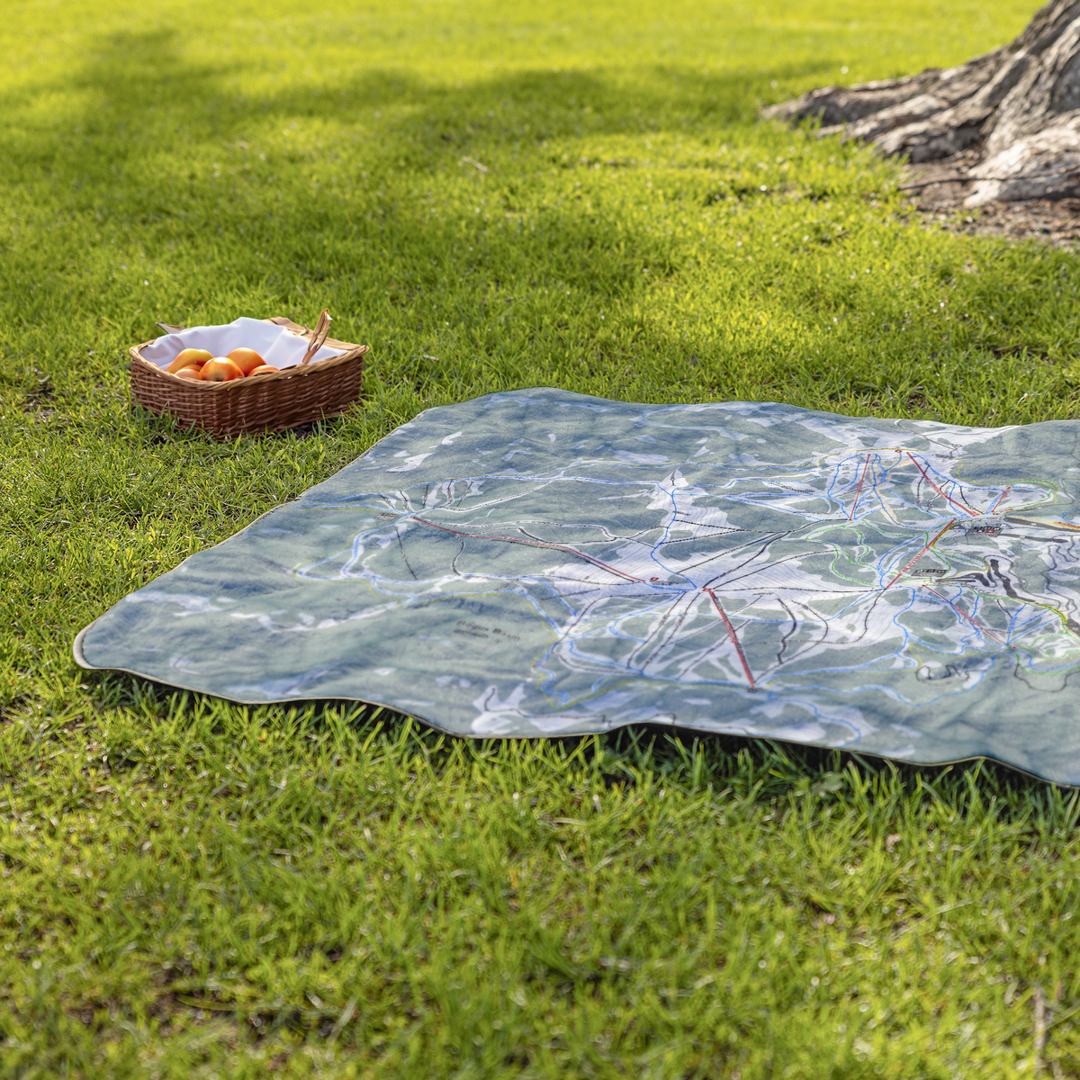 BogusBasin-Big_StadiumBlanket_Lifestyle_Grass_V_AS_Mockup.png