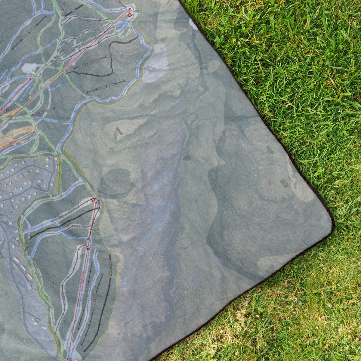 BoltonValley_StadiumBlanket_OverheadGrass_V_Mockup.png