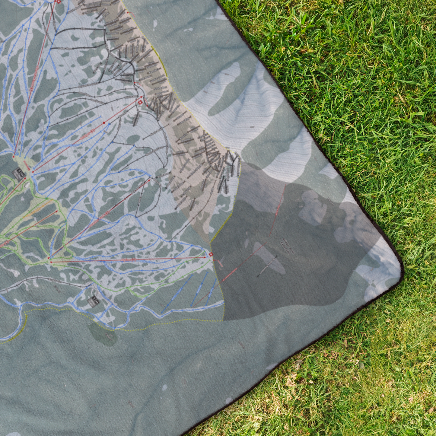 Bridger_Bowl_StadiumBlanket_OverheadGrass_V_Mockup.png