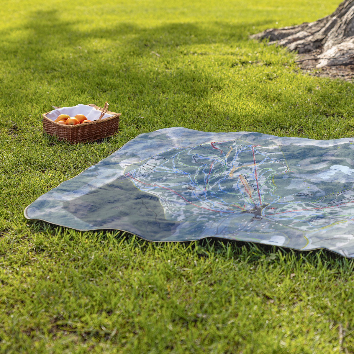 Brighton_Utah_Ski_Resort_Map_Concert_Bl_StadiumBlanket_Lifestyle_Grass_V_AS_Mockup.png