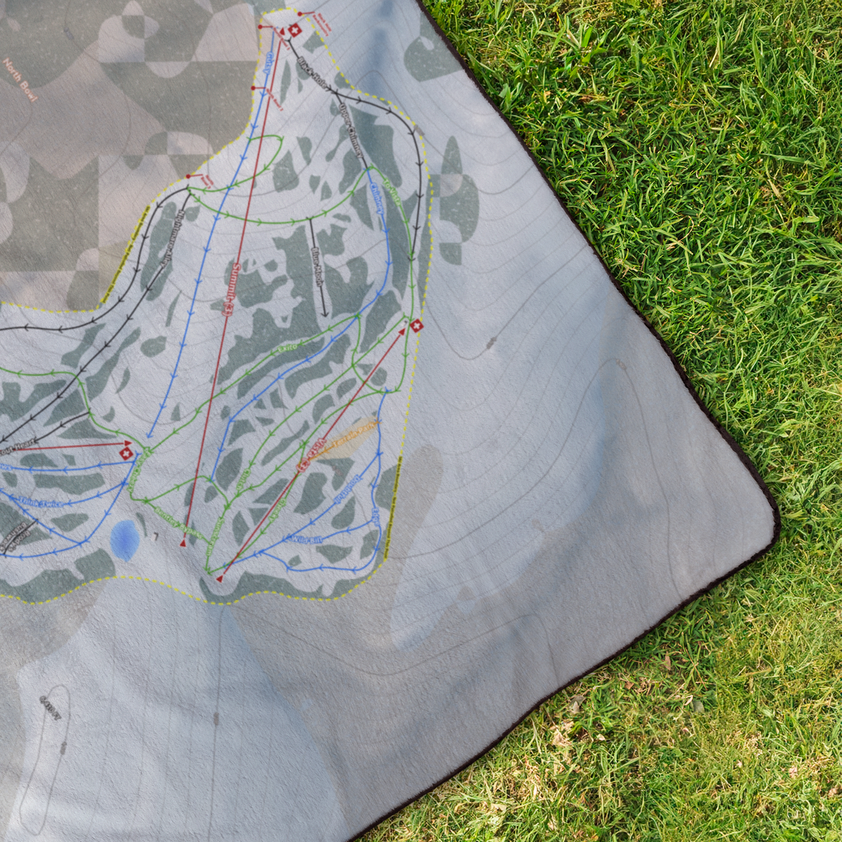 CherryPeak_StadiumBlanket_OverheadGrass_V_Mockup.png
