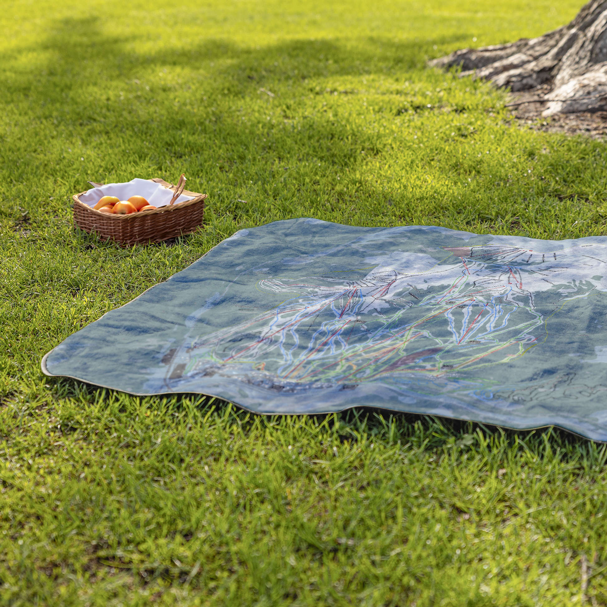 CopperMountain_StadiumBlanket_Lifestyle_Grass_V_AS_Mockup.png