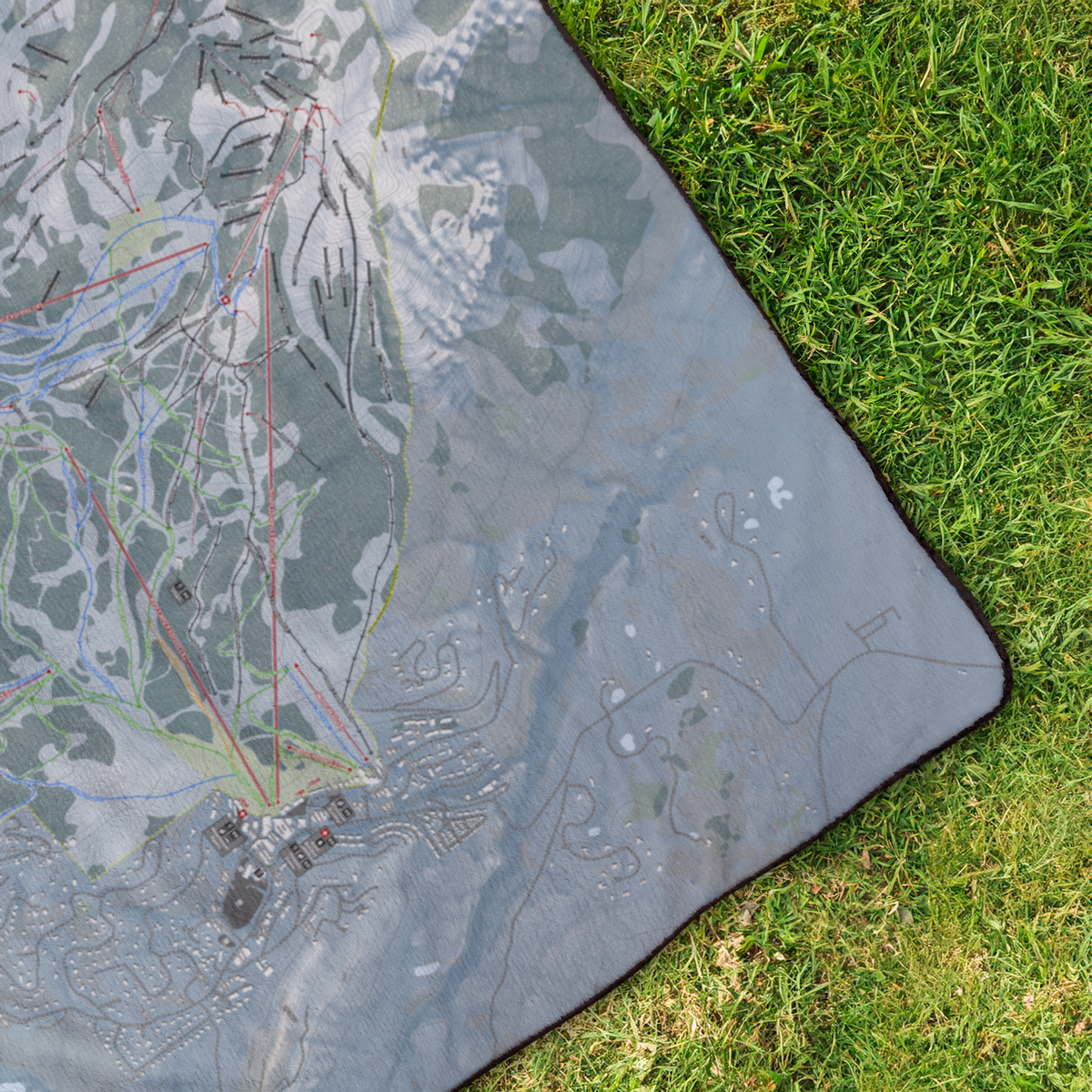CrestedButte_StadiumBlanket_OverheadGrass_V_Mockup.png