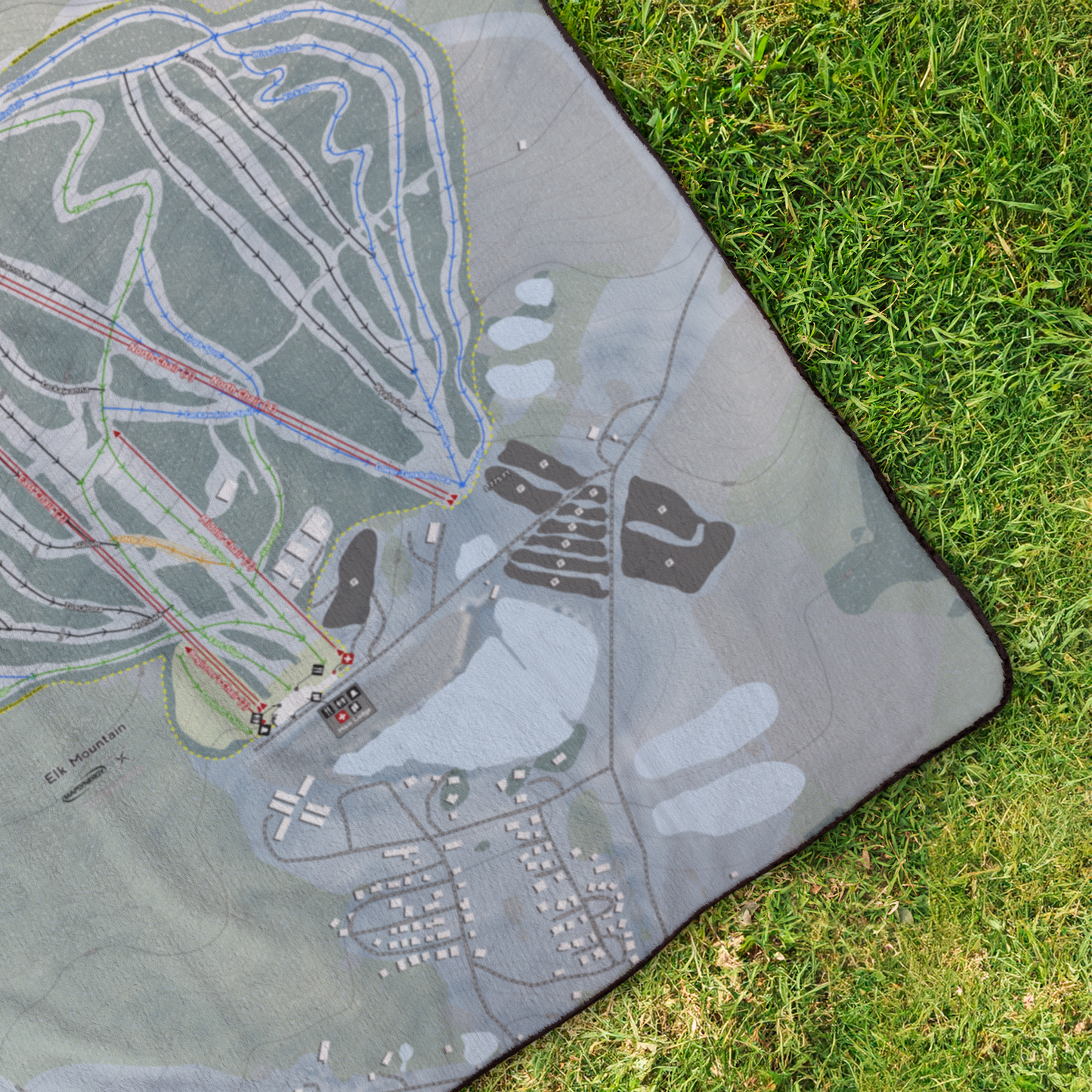 Elk_Mountain_StadiumBlanket_OverheadGrass_V_Mockup.png