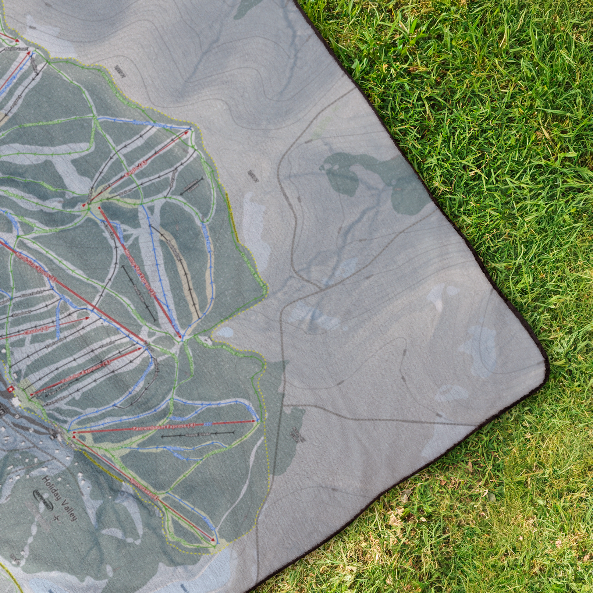 Holiday_Valley_StadiumBlanket_OverheadGrass_V_Mockup.png