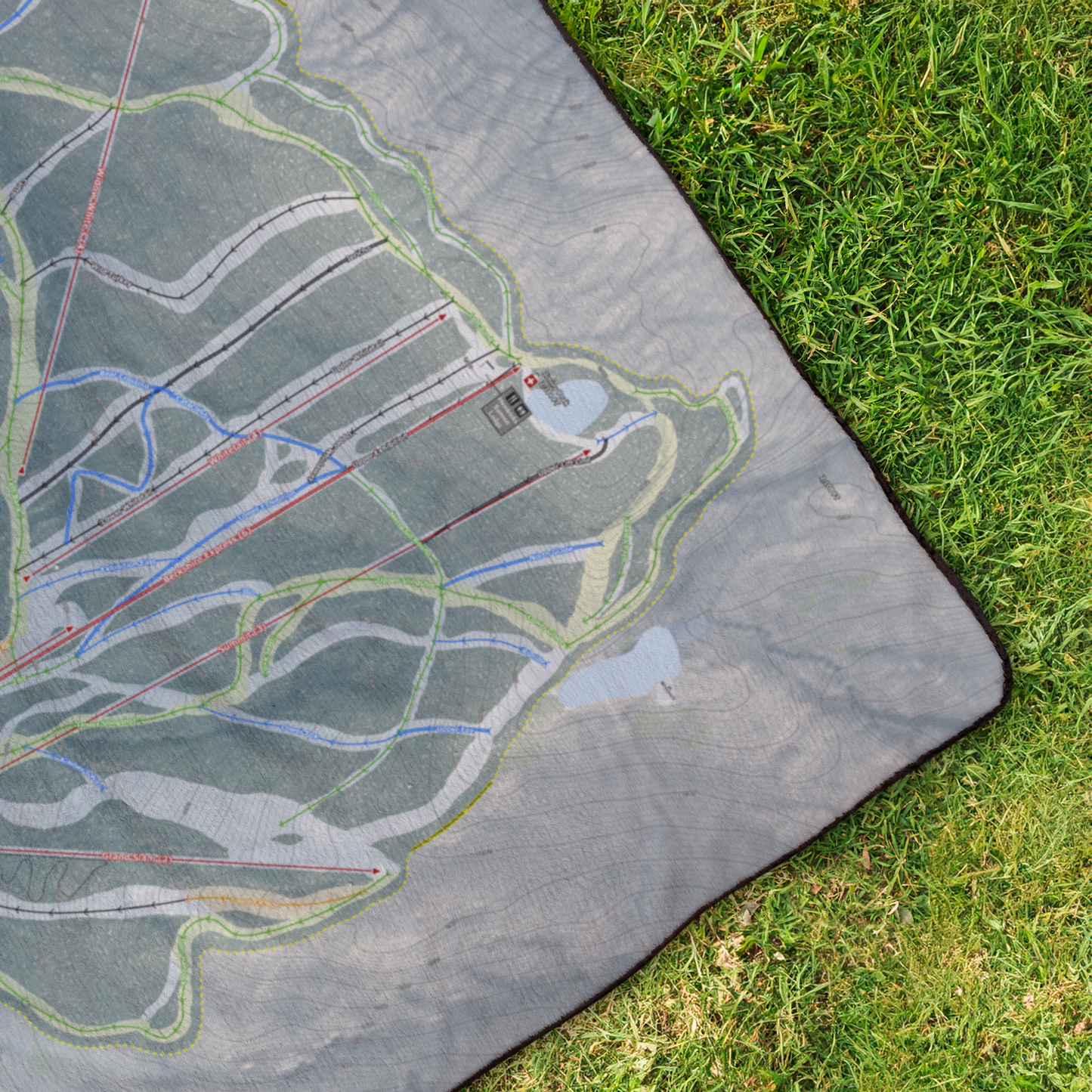 Jiminy_Peak_StadiumBlanket_OverheadGrass_V_Mockup.png