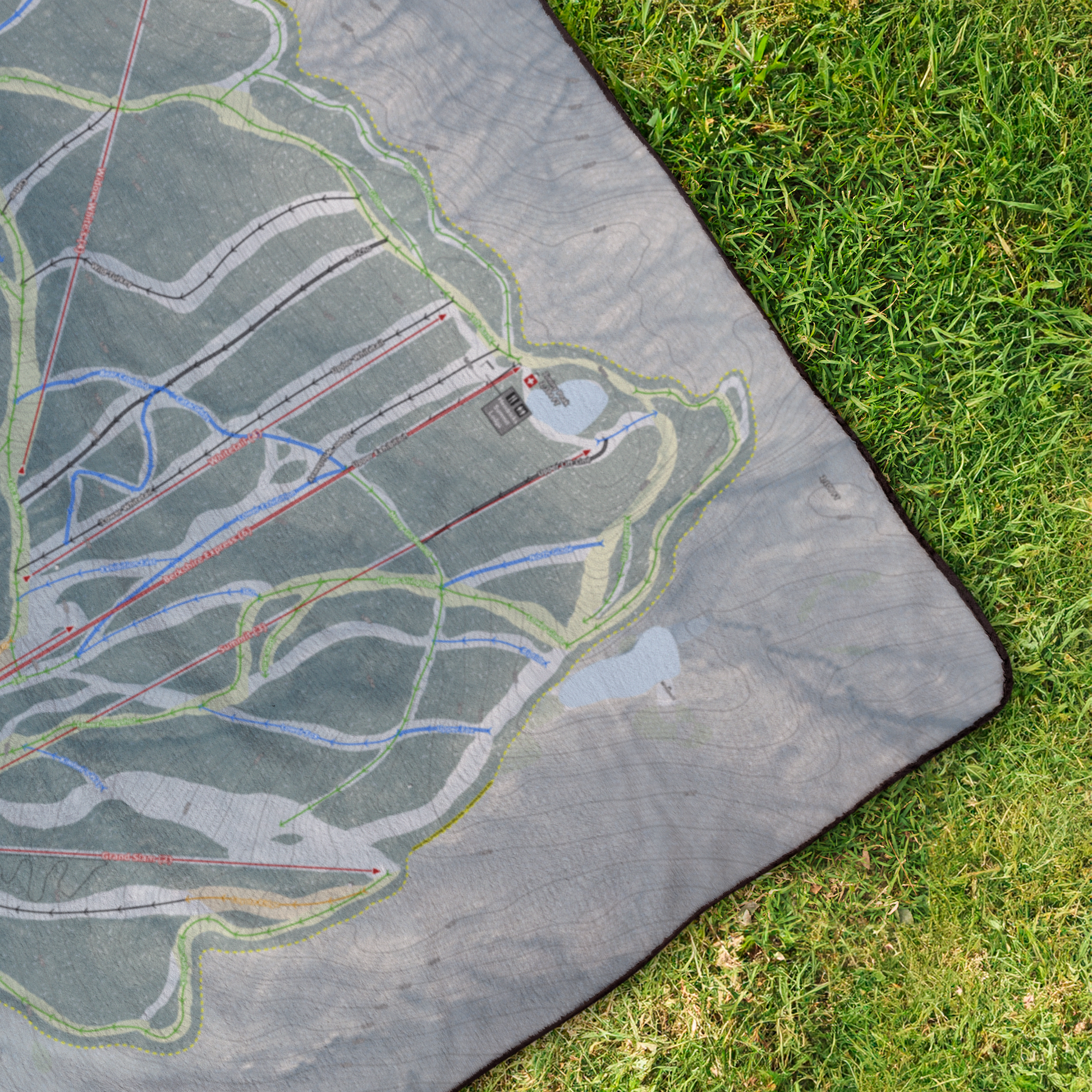 Jiminy_Peak_StadiumBlanket_OverheadGrass_V_Mockup.png