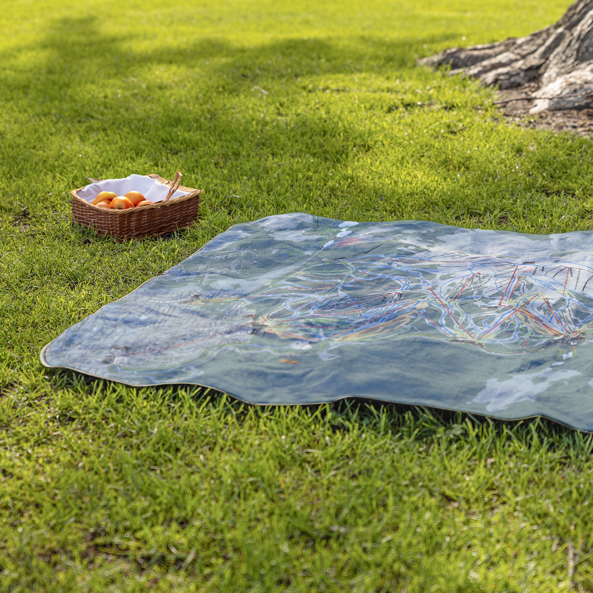 MammothMountain_StadiumBlanket_Lifestyle_Grass_V_AS_Mockup.png