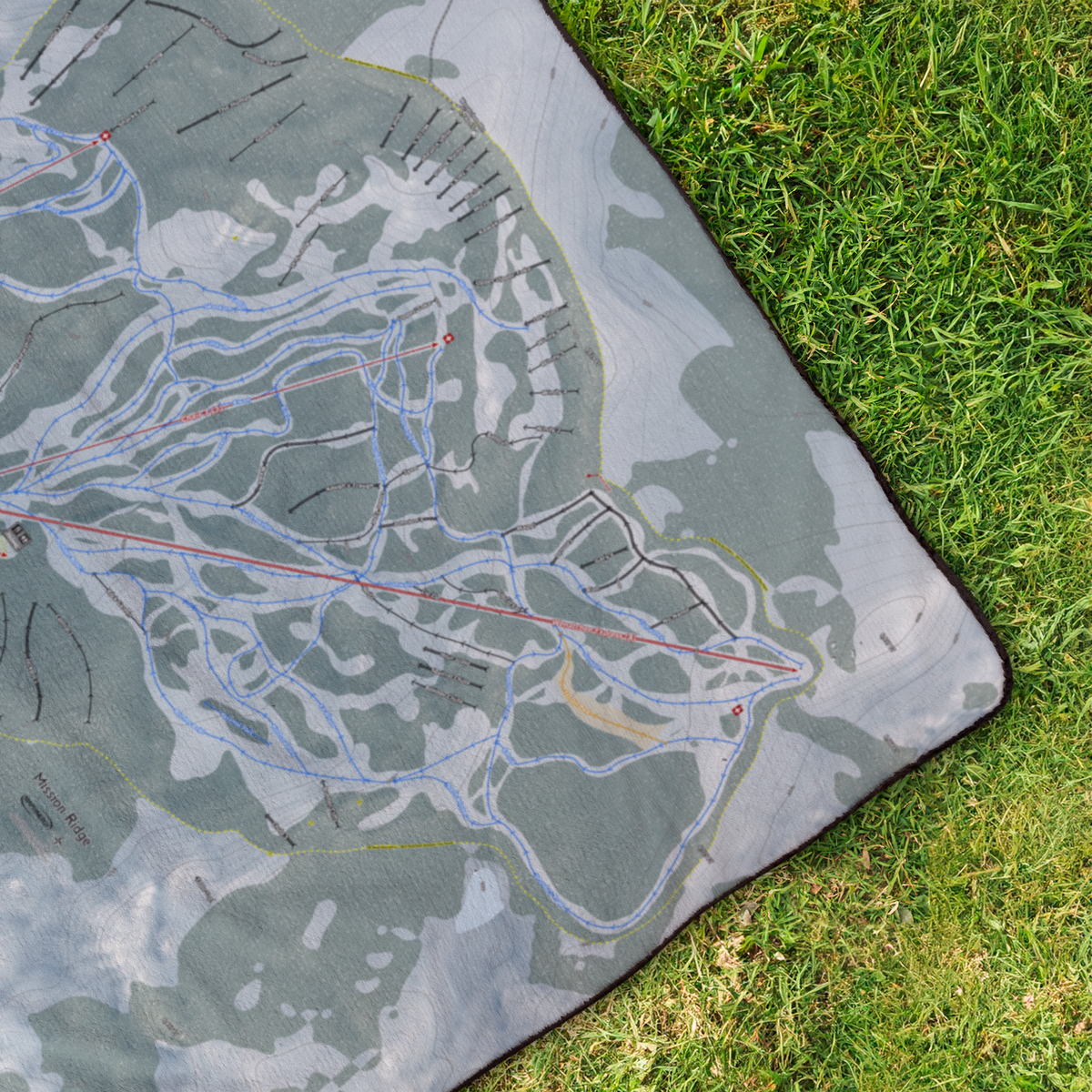 Mission_Ridge_StadiumBlanket_OverheadGrass_V_Mockup.png