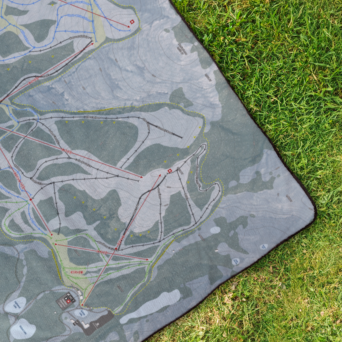 Mt_Baker_StadiumBlanket_OverheadGrass_V_Mockup.png
