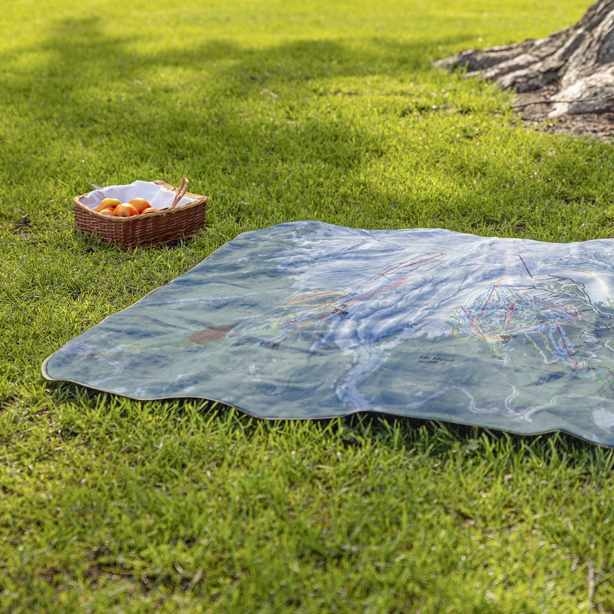 Mt_Hood_StadiumBlanket_Lifestyle_Grass_V_AS_Mockup.png