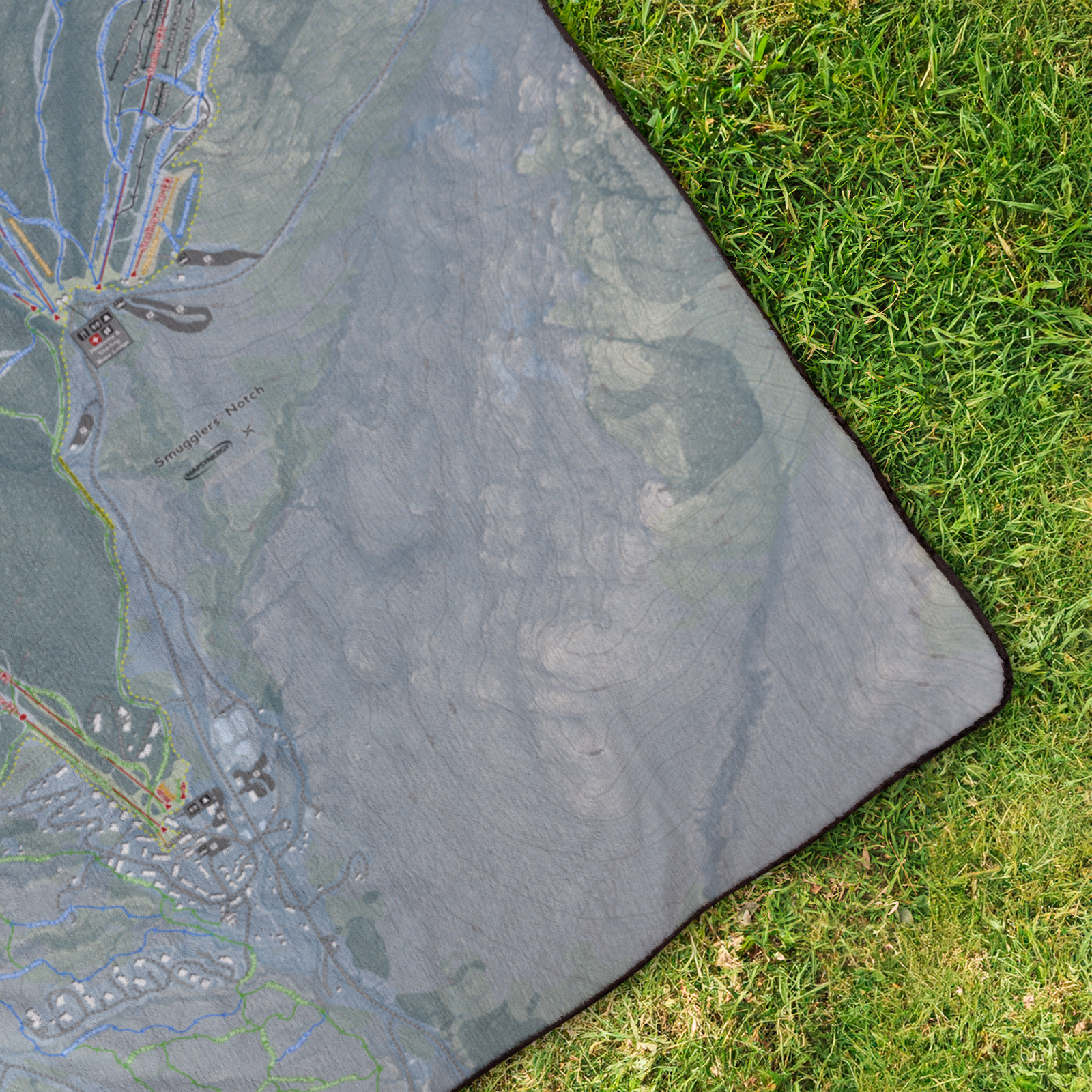 Smugglers_Notch_StadiumBlanket_OverheadGrass_V_Mockup.png
