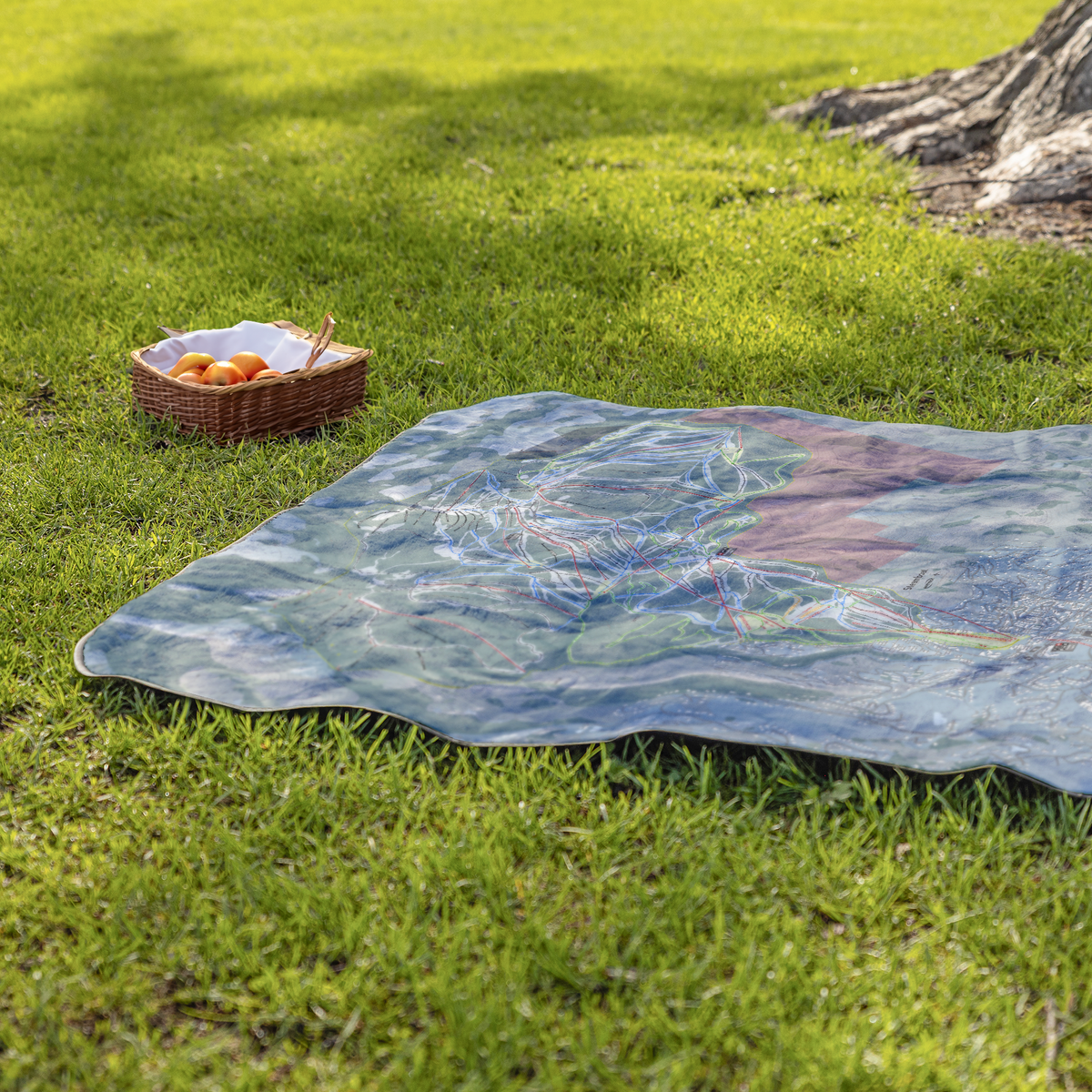Steamboat_StadiumBlanket_Lifestyle_Grass_V_AS_Mockup.png