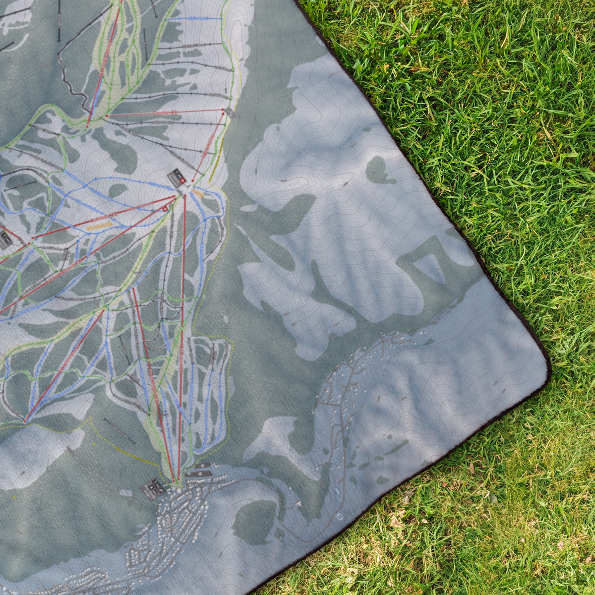 SunValley_StadiumBlanket_OverheadGrass_V_Mockup.png