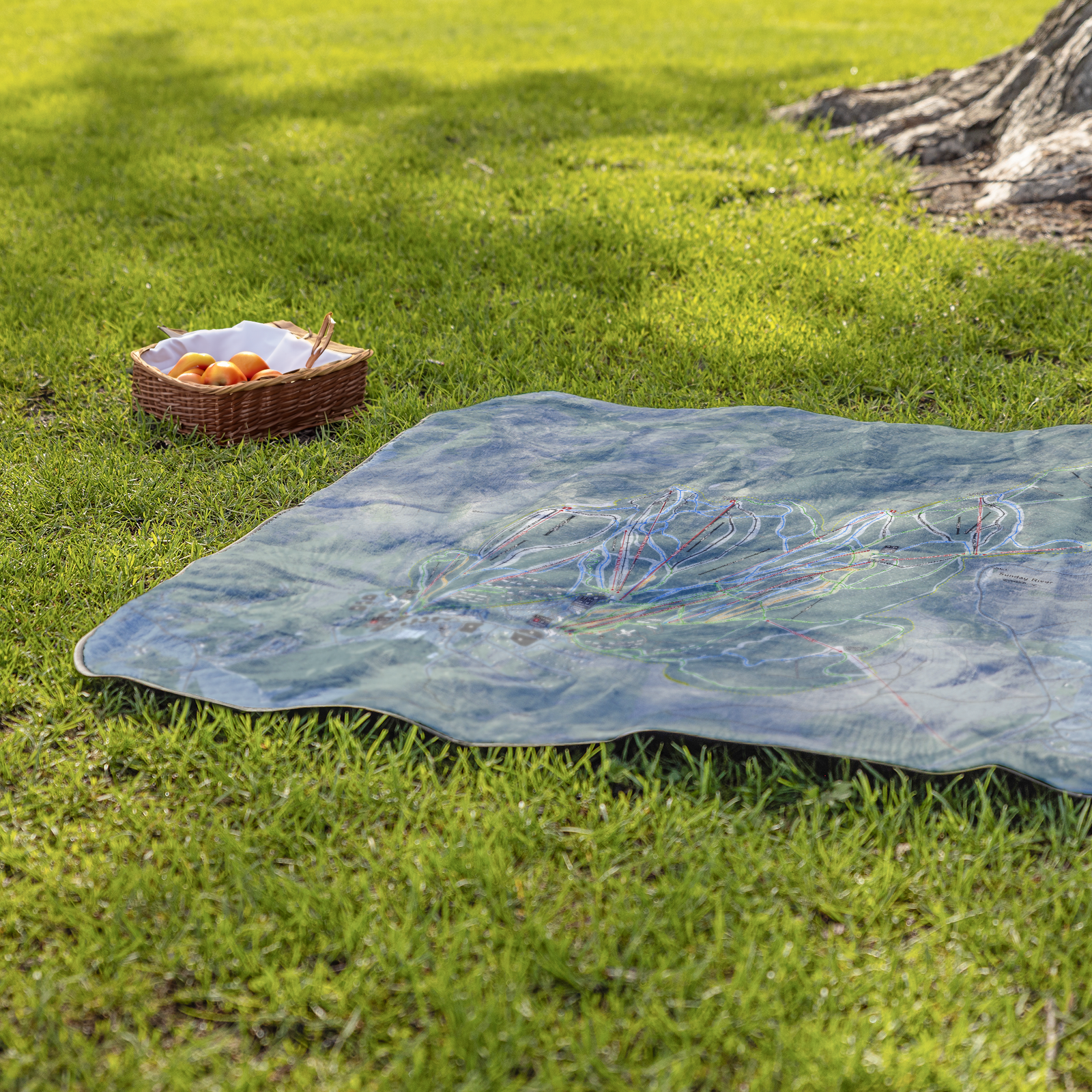 Sunday_River_StadiumBlanket_Lifestyle_Grass_V_AS_Mockup.png