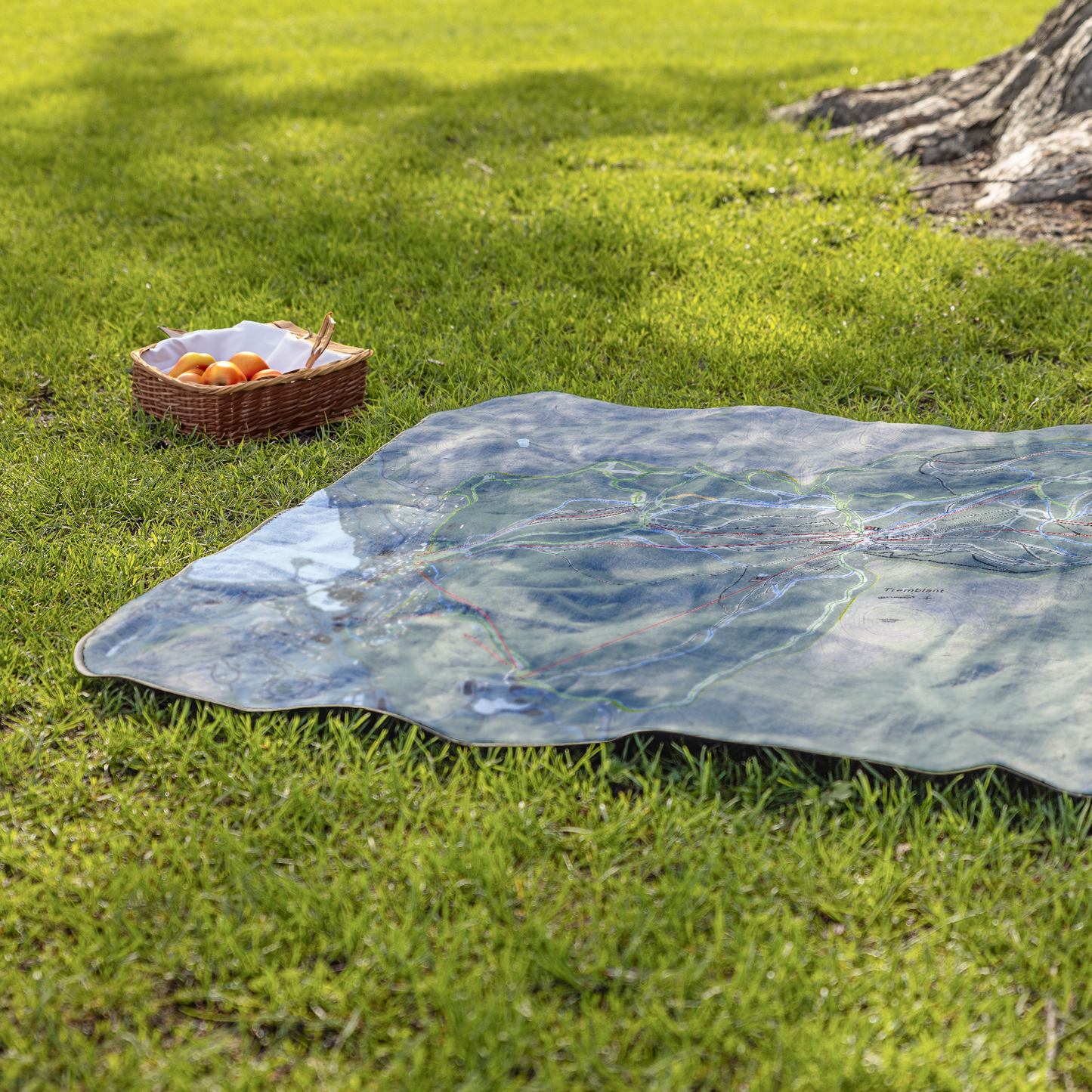 Tremblant_StadiumBlanket_Lifestyle_Grass_V_AS_Mockup.png