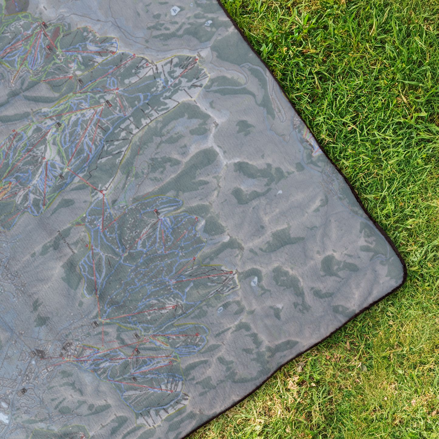 WasatchBack_StadiumBlanket_OverheadGrass_V_Mockup.png