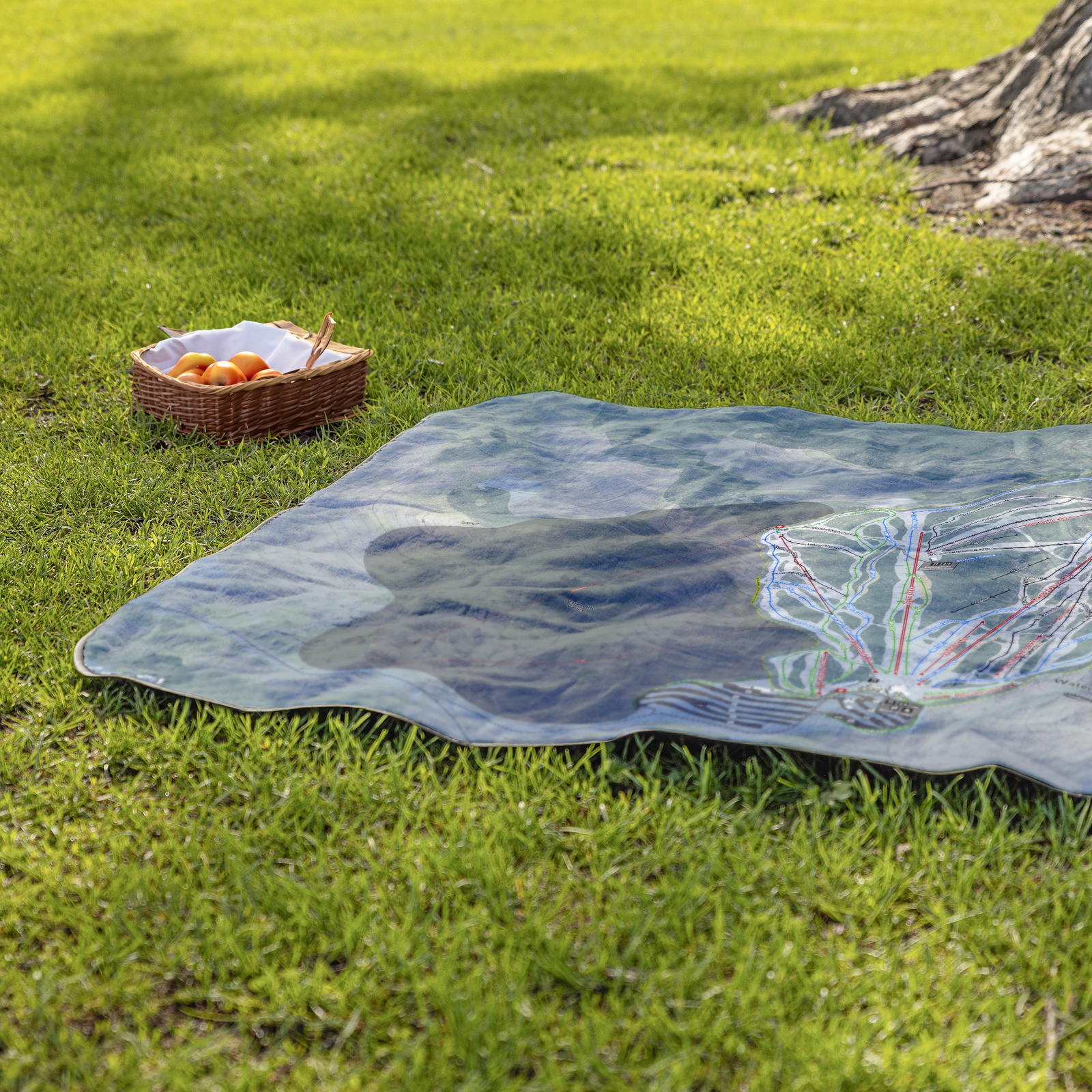 WatervilleValley_StadiumBlanket_Lifestyle_Grass_V_AS_Mockup.png