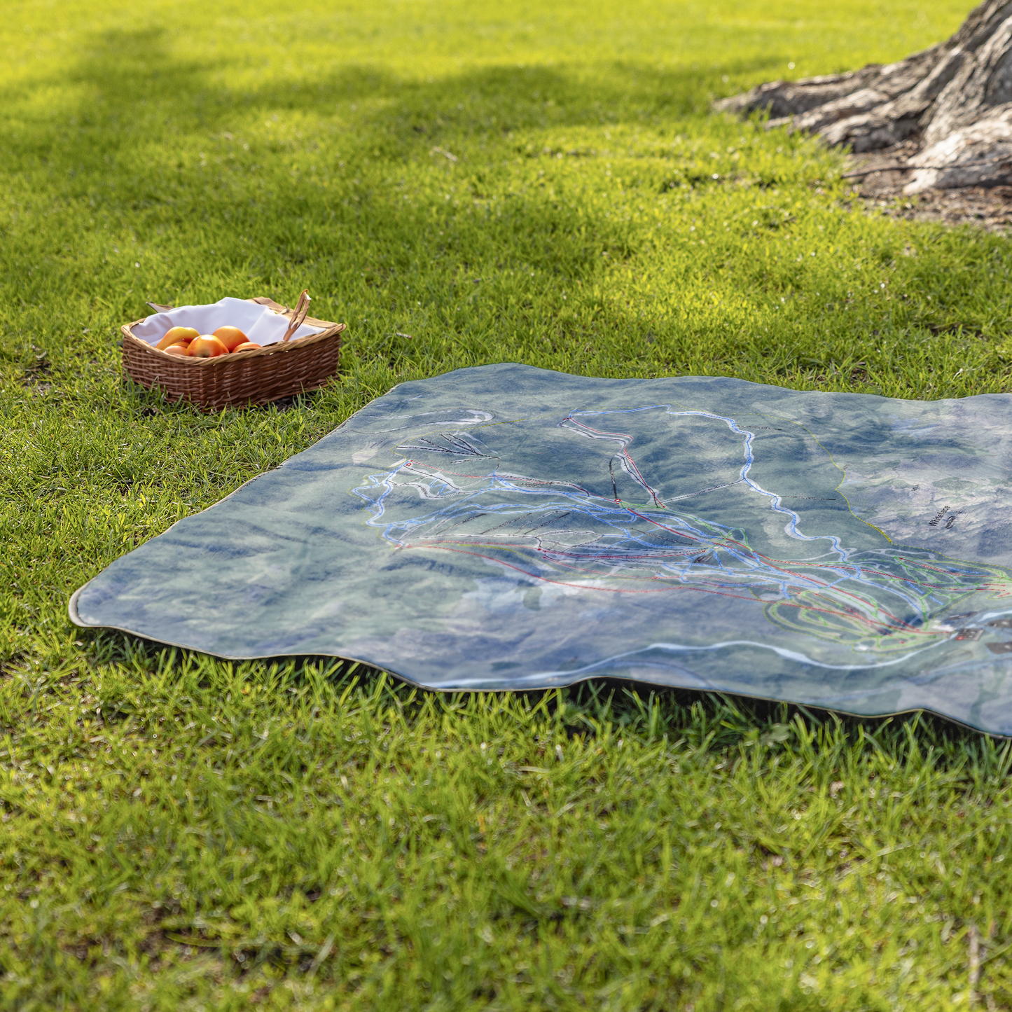 Whiteface_Mountain_StadiumBlanket_Lifestyle_Grass_V_AS_Mockup.png