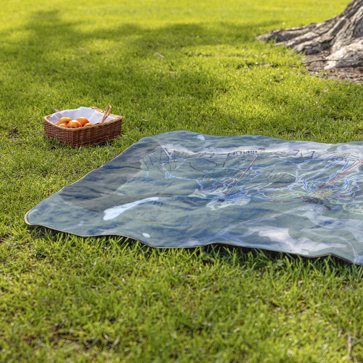 Wolfcreek_StadiumBlanket_Lifestyle_Grass_V_AS_Mockup.png