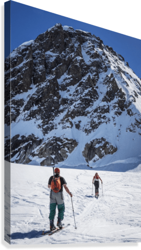 A couple telemark skiing on the Ruth Glacier - Powderaddicts