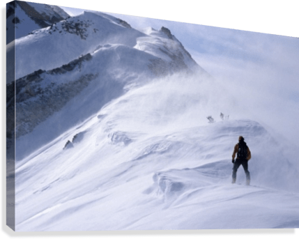 Back Country Skier Climbing Ridge - Powderaddicts