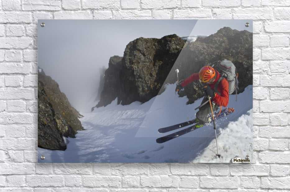 Backcountry skier on West Twin Peak near Eklutna - Powderaddicts