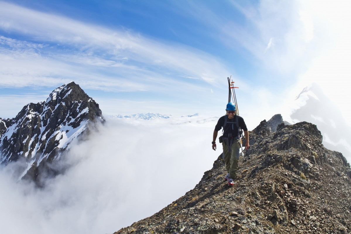 Backcountry skier on West Twin Peak near Eklutna - Powderaddicts