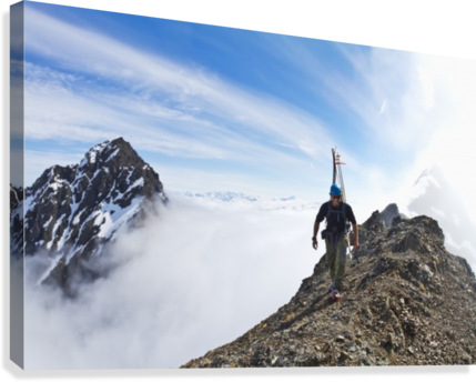 Backcountry skier on West Twin Peak near Eklutna - Powderaddicts