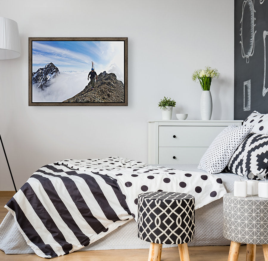Backcountry skier on West Twin Peak near Eklutna - Powderaddicts