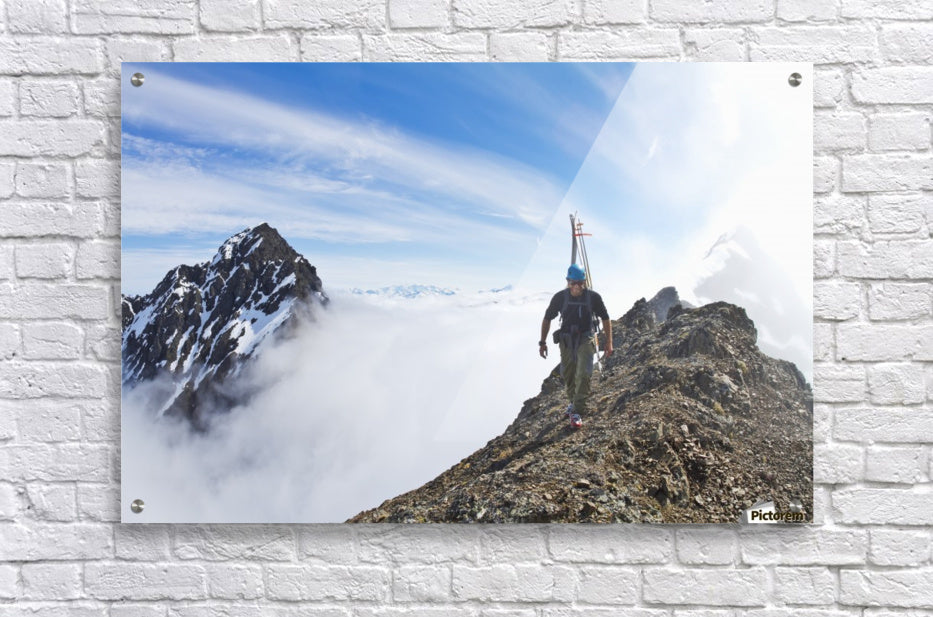 Backcountry skier on West Twin Peak near Eklutna - Powderaddicts