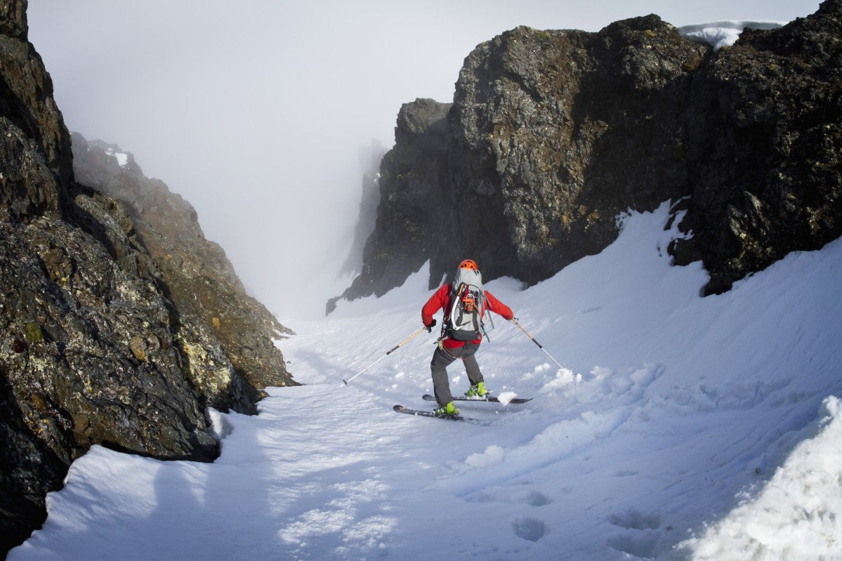 Backcountry skier on West Twin Peak near Eklutna, Western Chugach Mountains, Southcentral Alaska, Winter - Powderaddicts