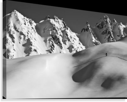 Backcountry skier skinning in the Iguana - Powderaddicts