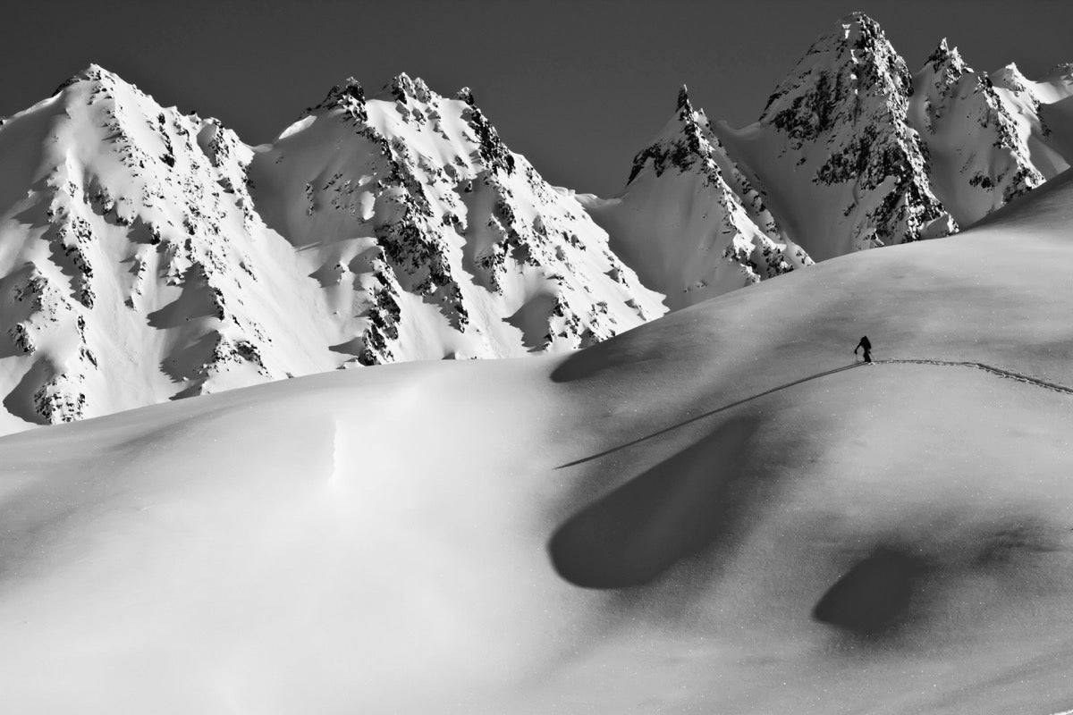 Backcountry skier skinning in the Iguana - Powderaddicts