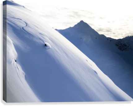 Man Backcountry Skiing In Powder Snow At Wolverine Bowl - Powderaddicts