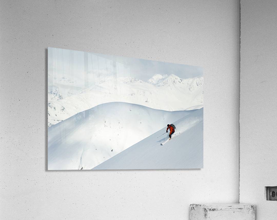 Man skiing the west face of Peak - Powderaddicts