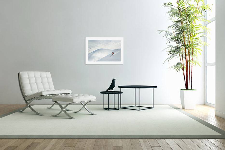 Man skiing the west face of Peak - Powderaddicts