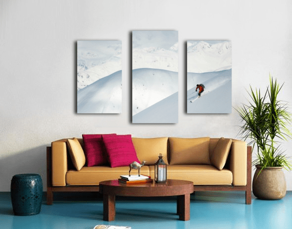 Man skiing the west face of Peak - Powderaddicts