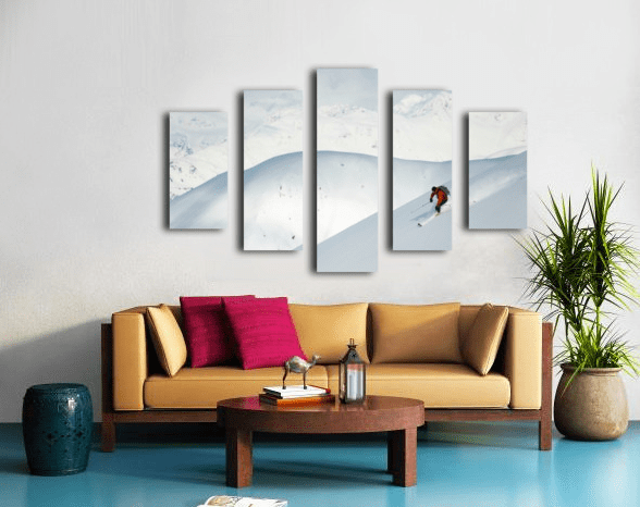 Man skiing the west face of Peak - Powderaddicts