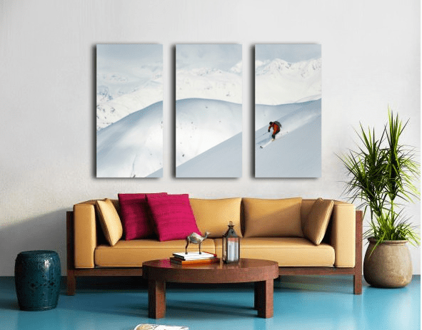 Man skiing the west face of Peak - Powderaddicts